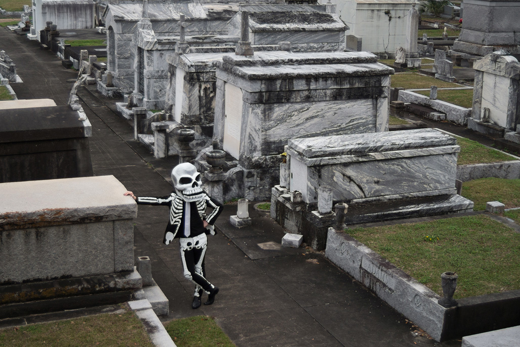 Me wearing my skeleton costume in a cemetery in New Orleans
