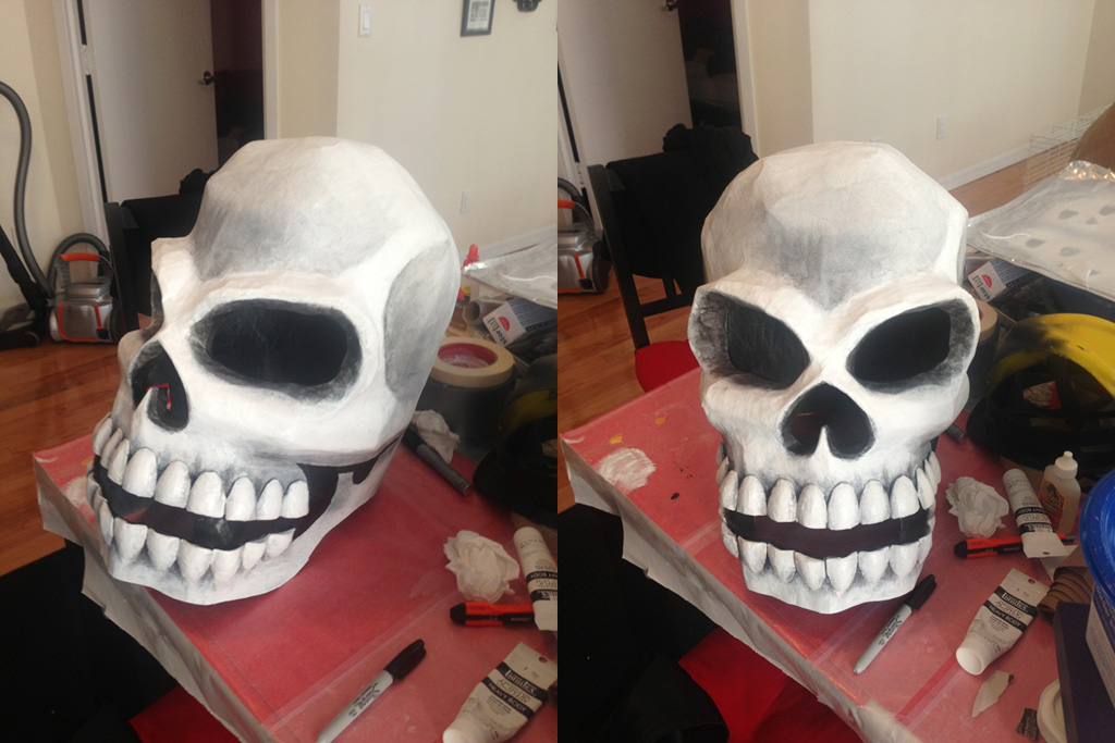 Paper mache skull mask with teeth added and painting finished