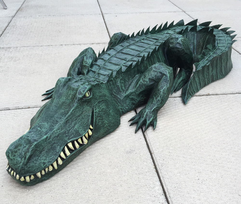 Paper maché alligator — waterproofing and painting