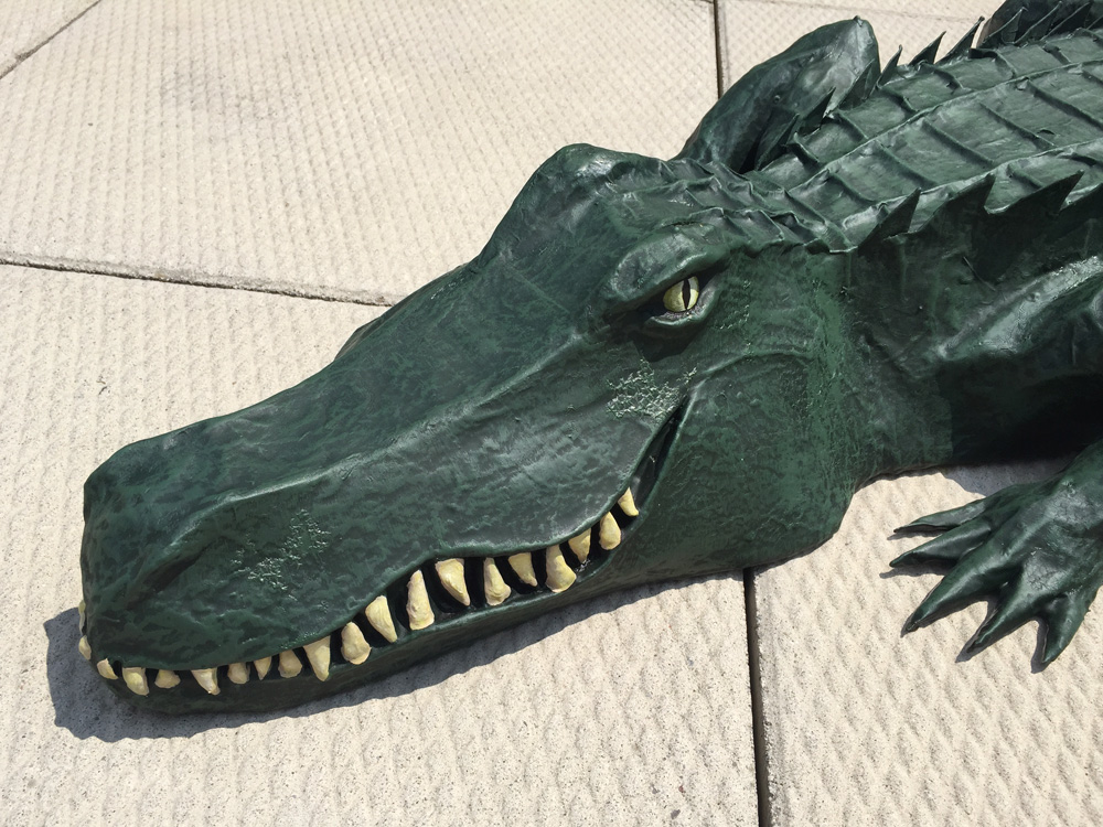 Paper mache alligator head closeup