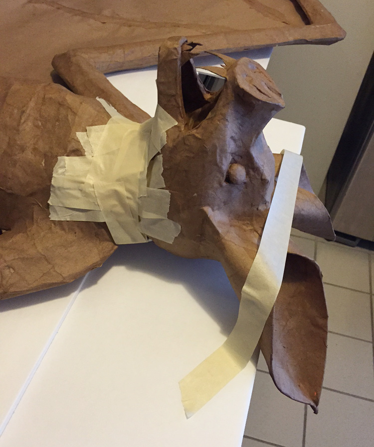 Papier mache bat -- using masking tape to create the neck