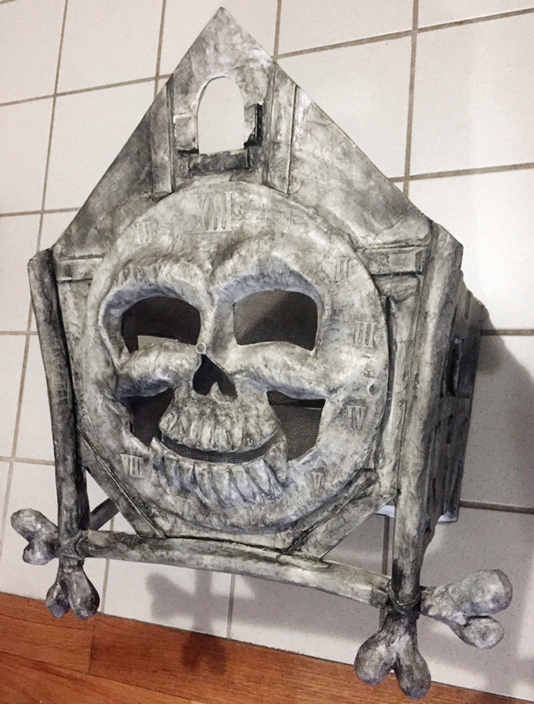 Cuckoo clock skull mask - Doing a wash with black acrylic paint and water