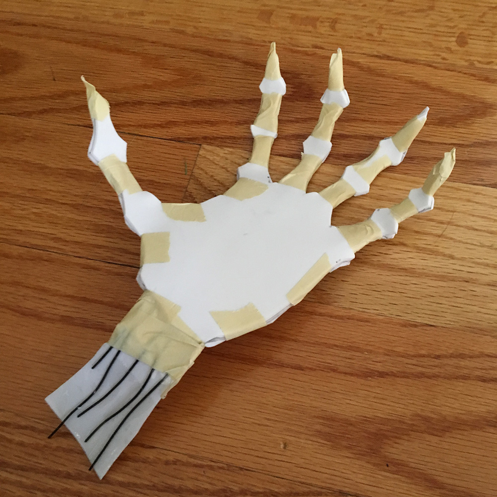 Paper mache ghost hands - taping bony fingers