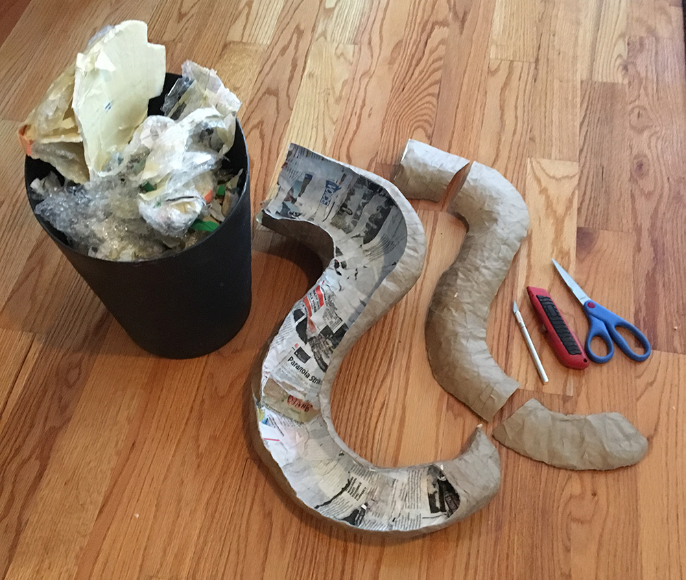 Ghost costume - removing the base materials from the paper mache tail