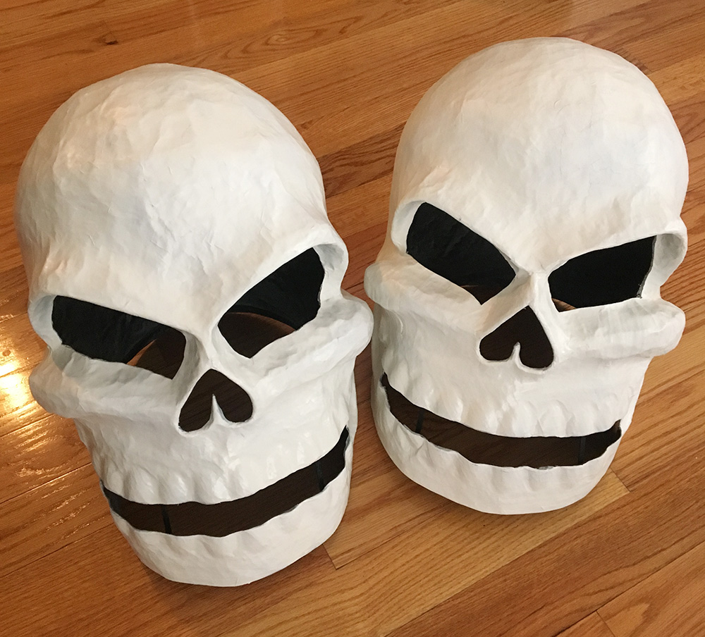 Twin paper mache skull masks - base coat