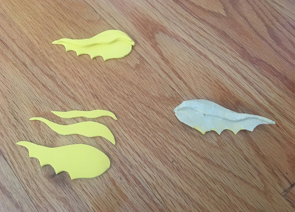 Papier mache sea serpent - making the ears from craft foam