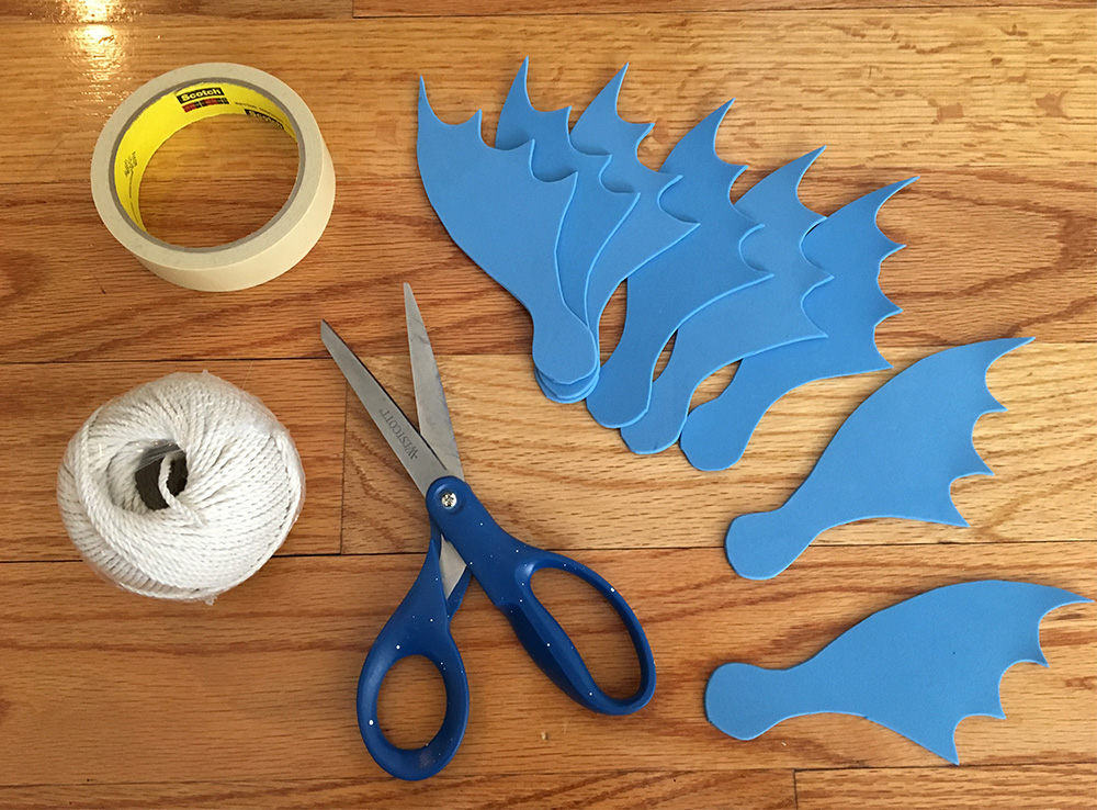 Paper mache sea serpent - making the fins