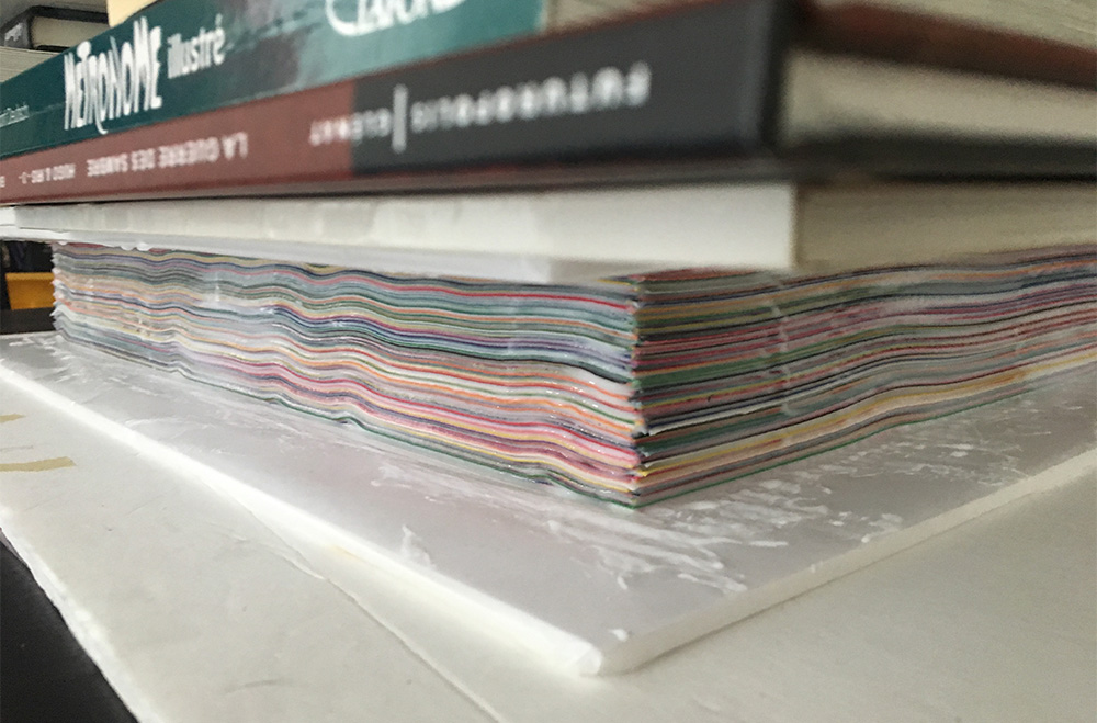 Haunted book sculpture - gluing the pages