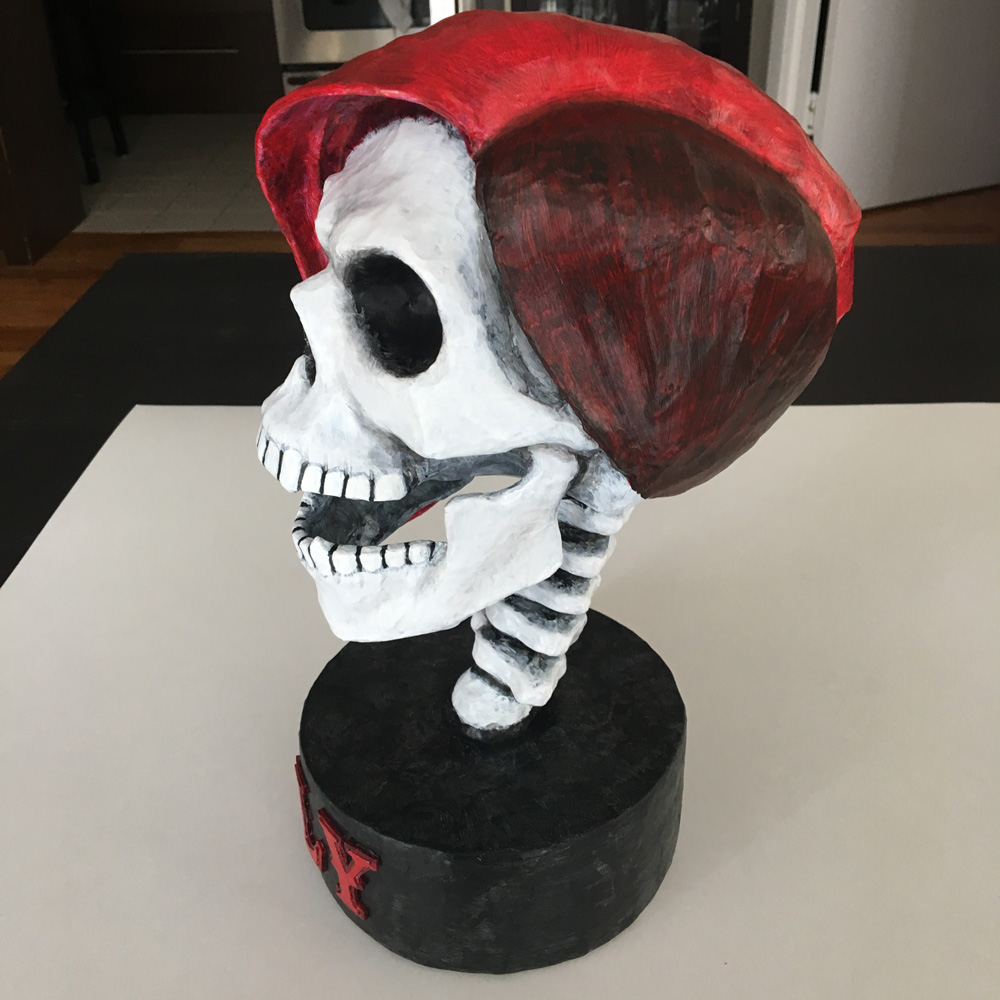 SLY skull sculpture - side view