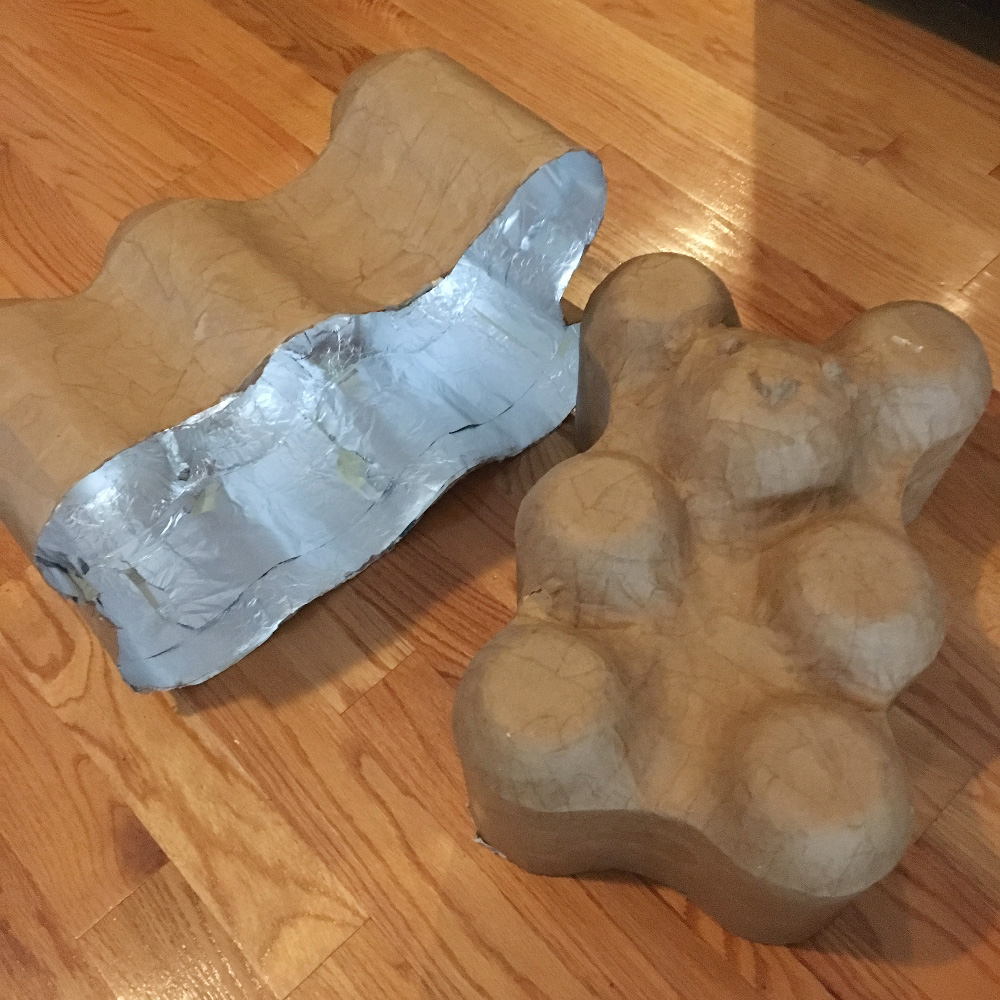 Making giant gummi bears - opening the paper mache