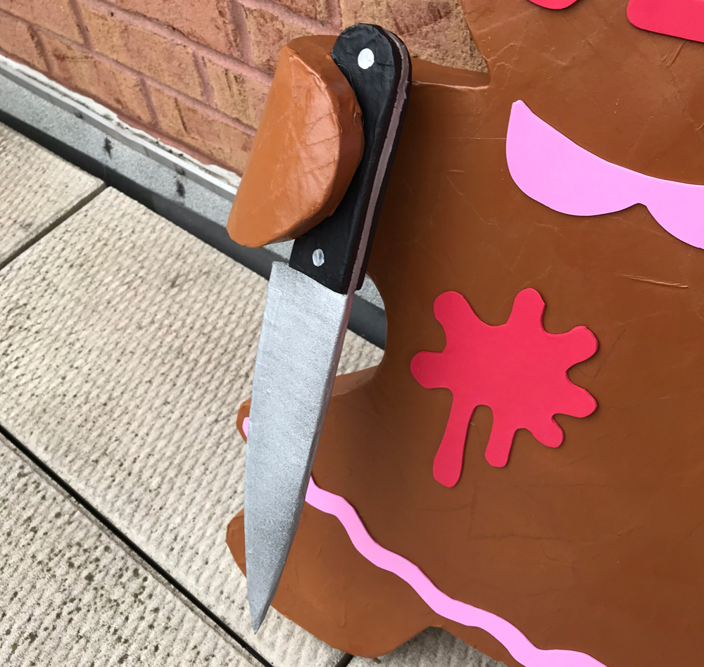 Paper mache kitch knife - close up in hand