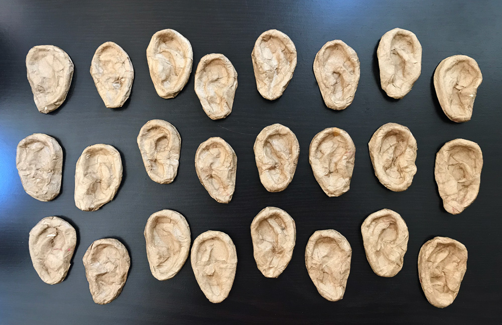 Paper mache heads -- making two dozen ears