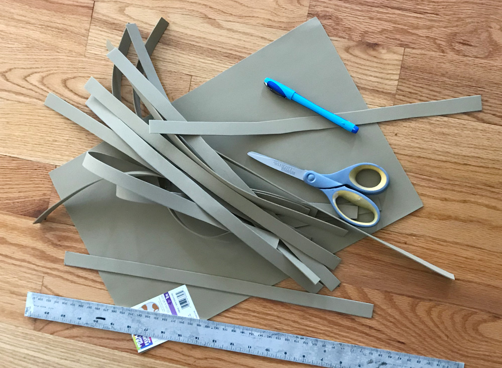 Paper mache axe - cutting out craft foam strips