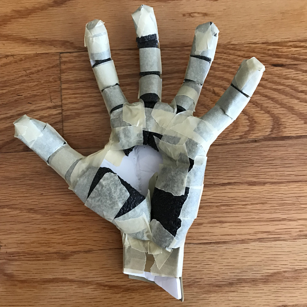 Paper mache Freddy Krueger glove prop - sculpting the palm