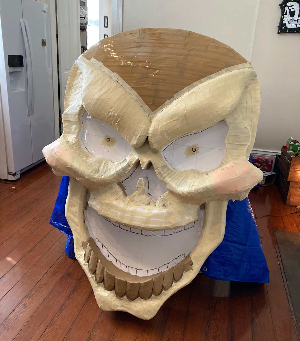 Giant paper maché skull Halloween decoration - sculpture almost finished