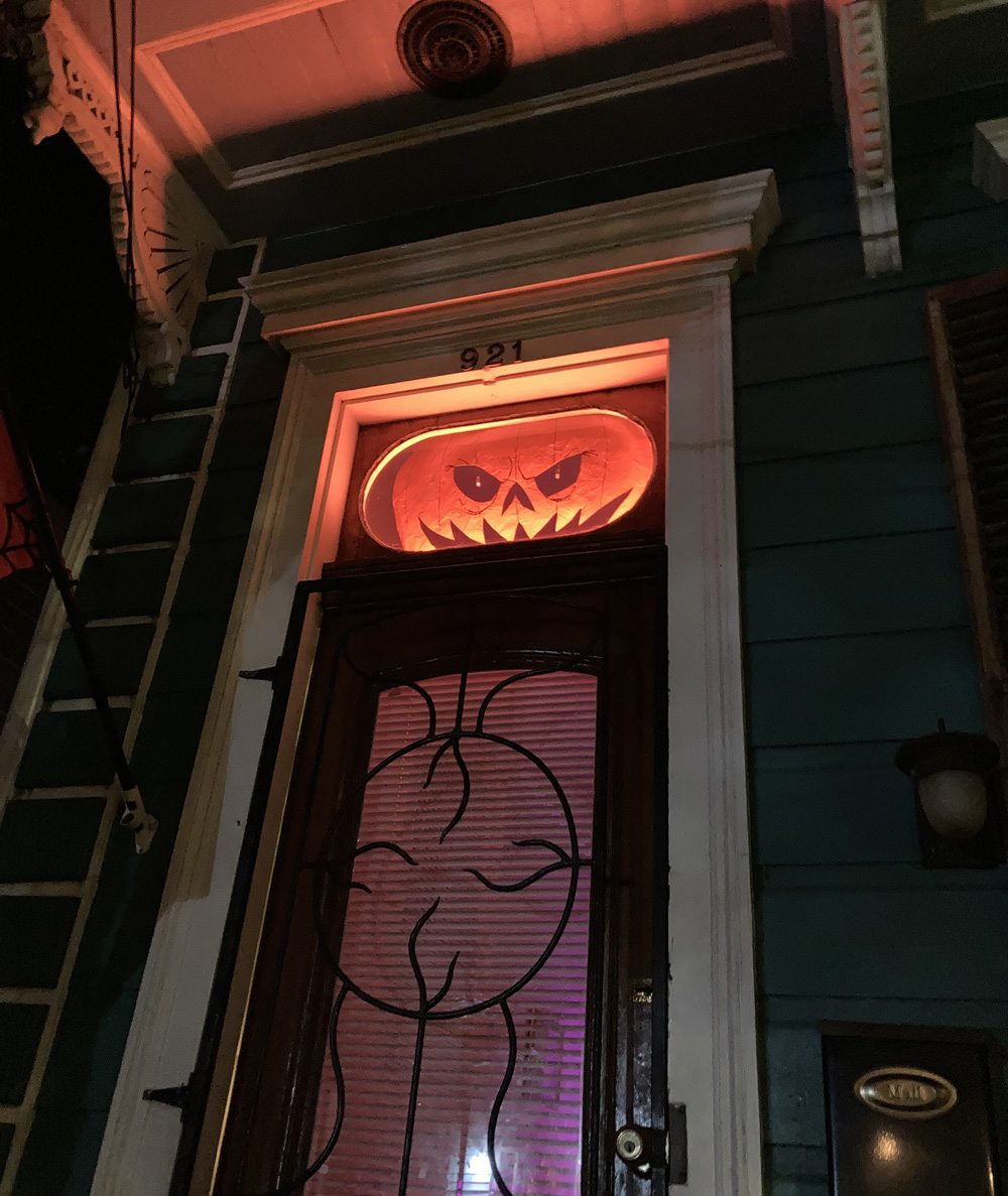 DIY pumpkin face window decoration - in position and lit up!