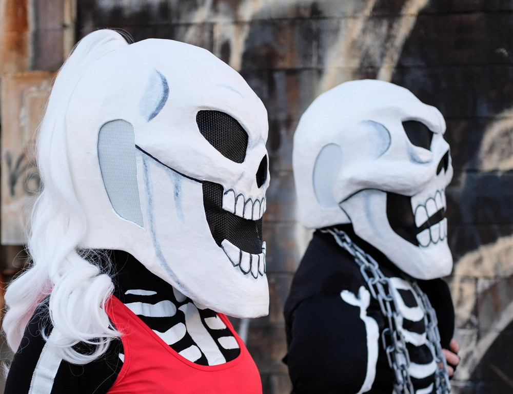 Pro wrestler skeleton costumes - side view of hair