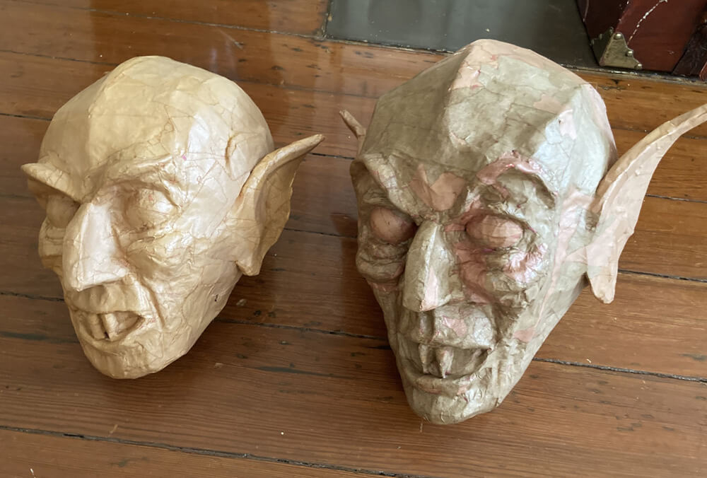 Paper maché Count Orlok statue - old head and new head together