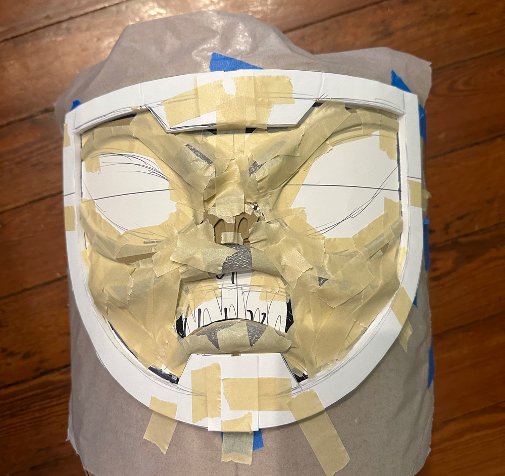 Making the alien face with bits of foam and tape