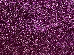 Magenta glitter-covered surface