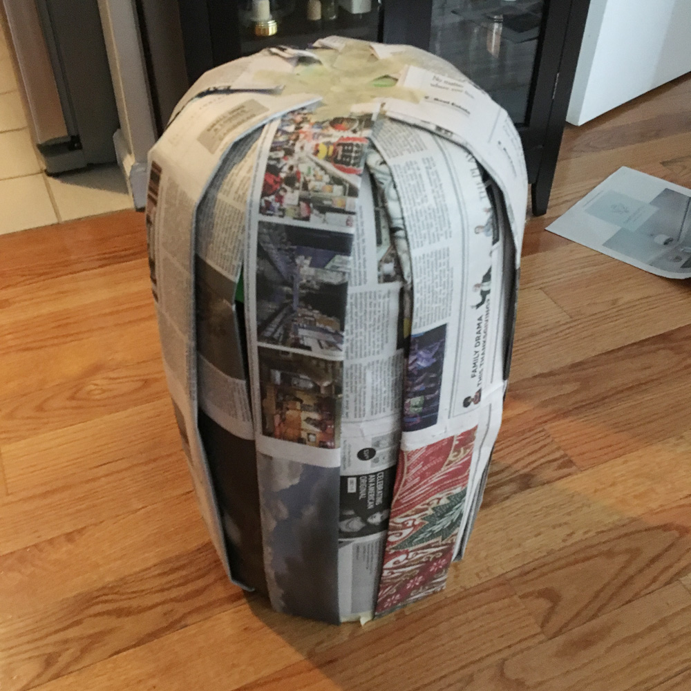 Axe Man skull mask - strips of folded newspaper