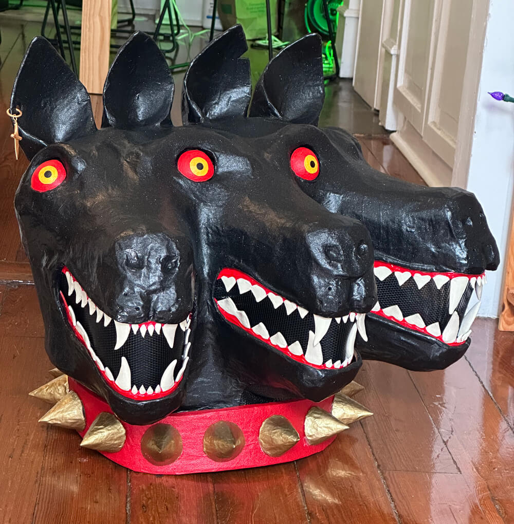 three quarter view of the finished Cerberus mask, sitting on the floor