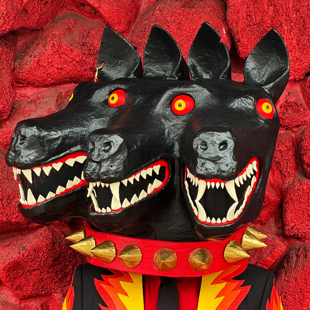 me wearing the Cerberus mask and costume, three quarter view, close up of the mask