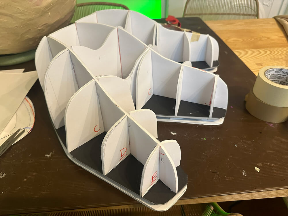 Adding curved pieces to create the snouts