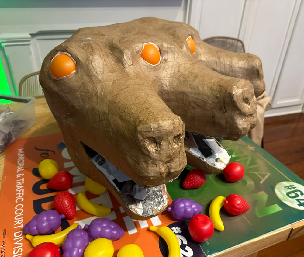Replacing the ping pong ball eyes with plastic oranges