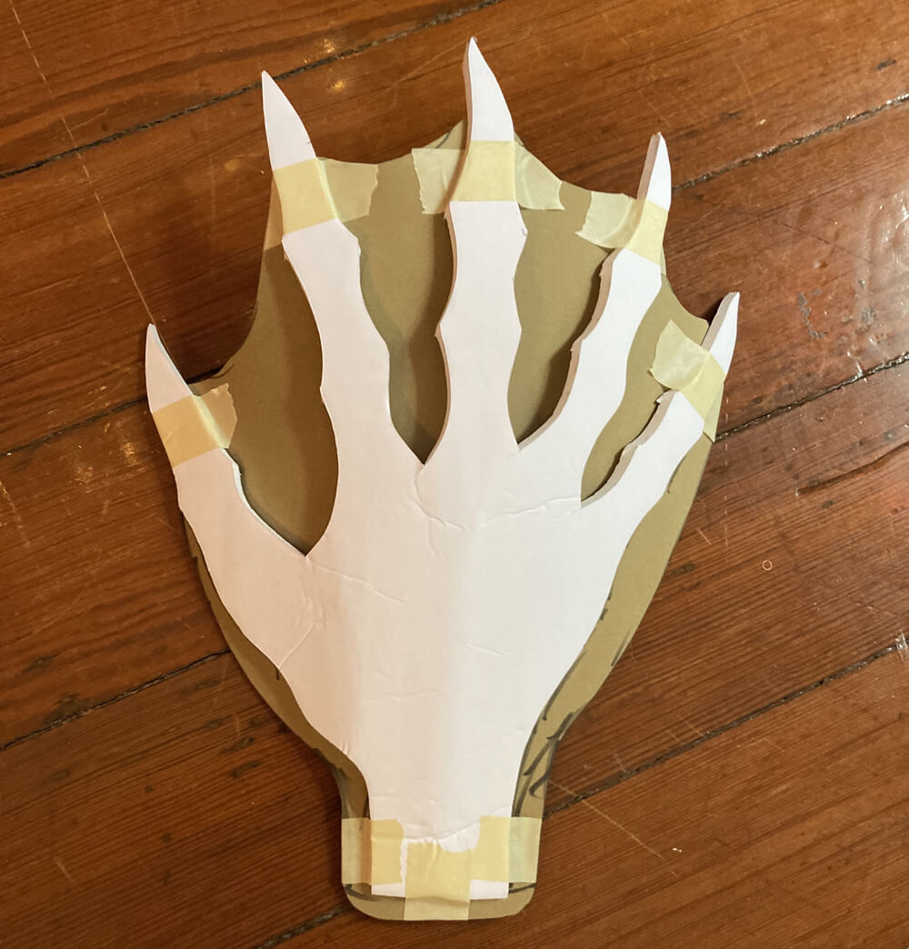 Foam fin taped onto foam hand