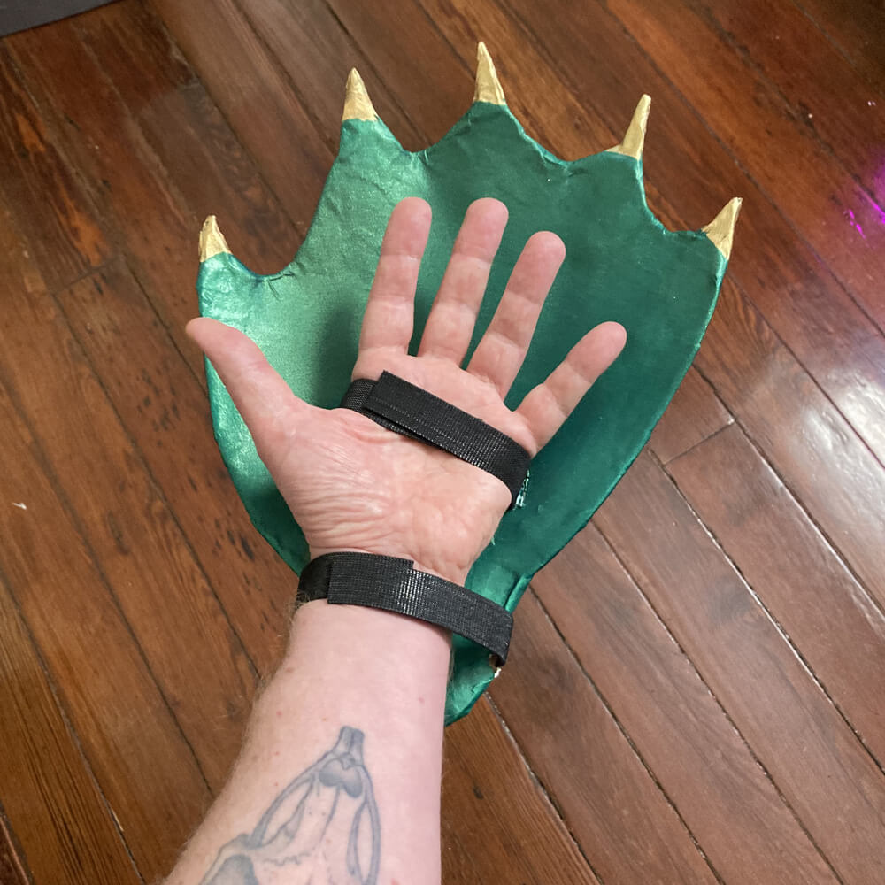 View of palm side of the hand, showing the velcro straps