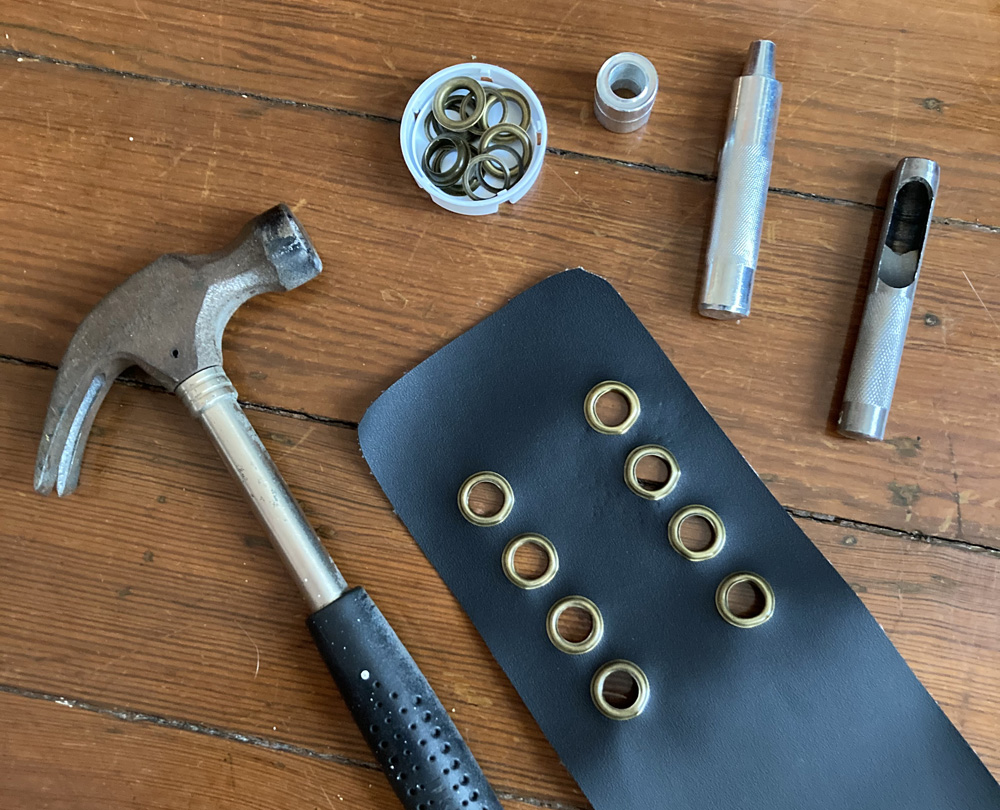 Pro wrestler belt prop - installing grommets