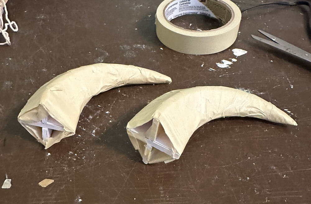Wrapping the horns in masking tape again