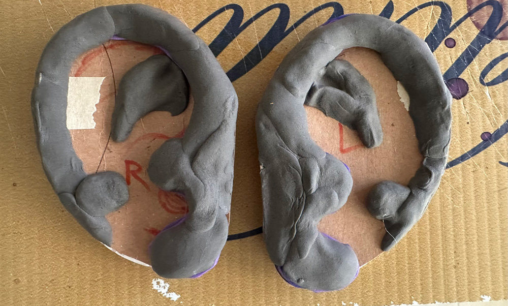 Foam clay covering the ears
