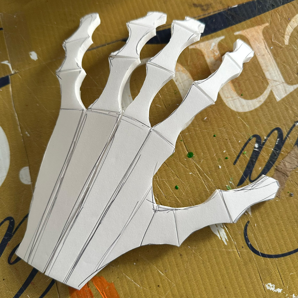 Cutting out the hands shapes and cutting the joints