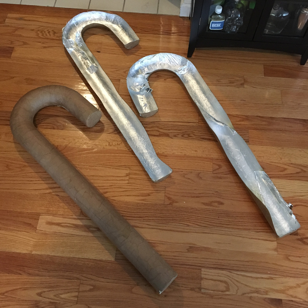 Making giant candy canes - opening the paper mache