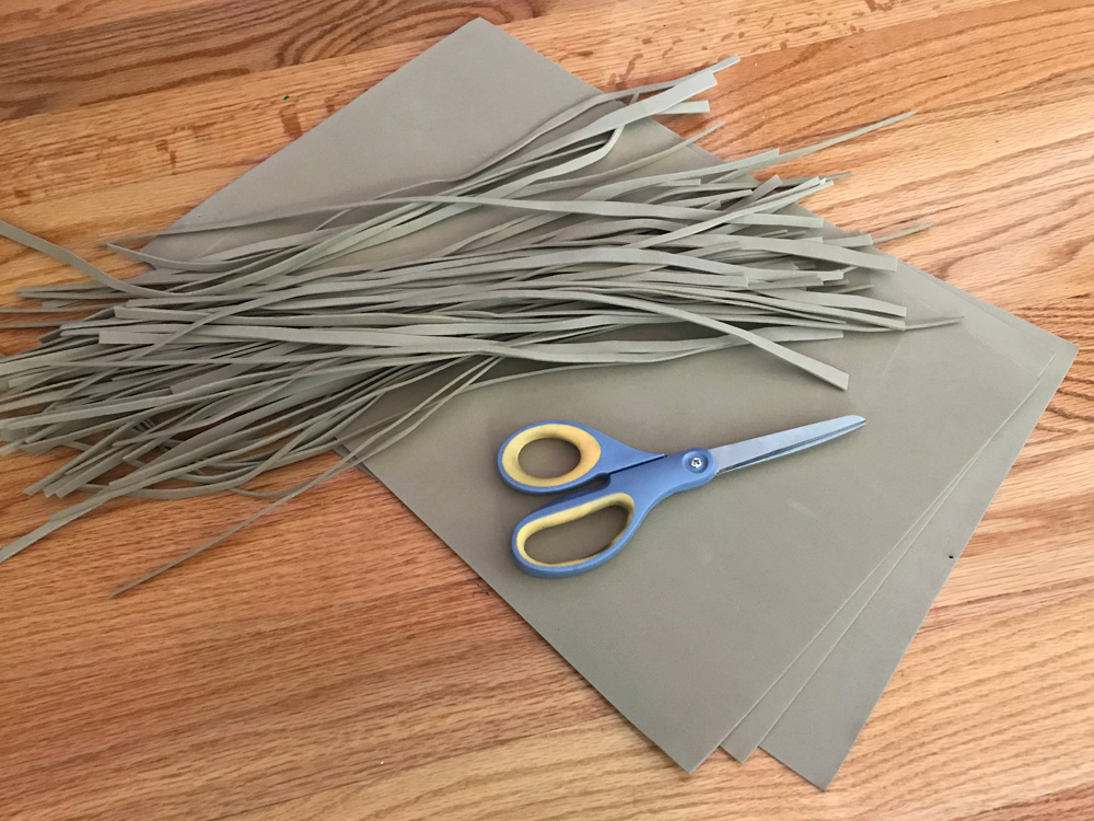 Giant witch statue - cutting craft foam to make the witch's hair