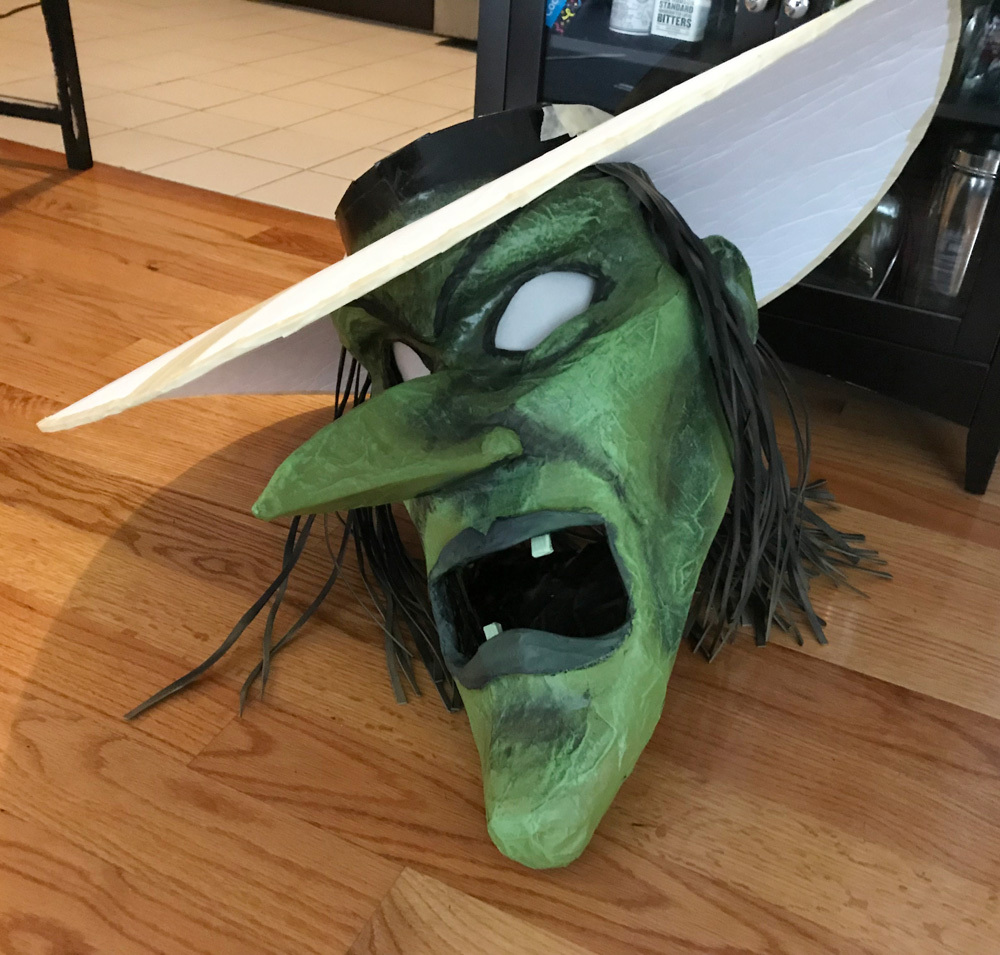 Giant witch statue - trying the hat on