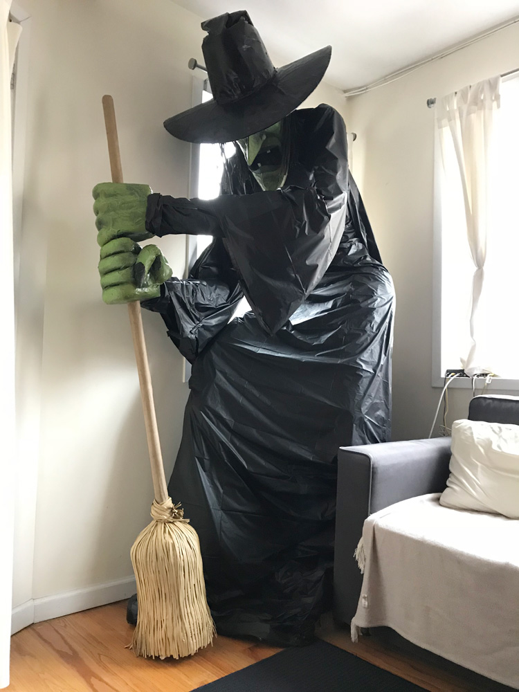 Giant witch statue made from paper mache, foam board, plastic table cloths, etc