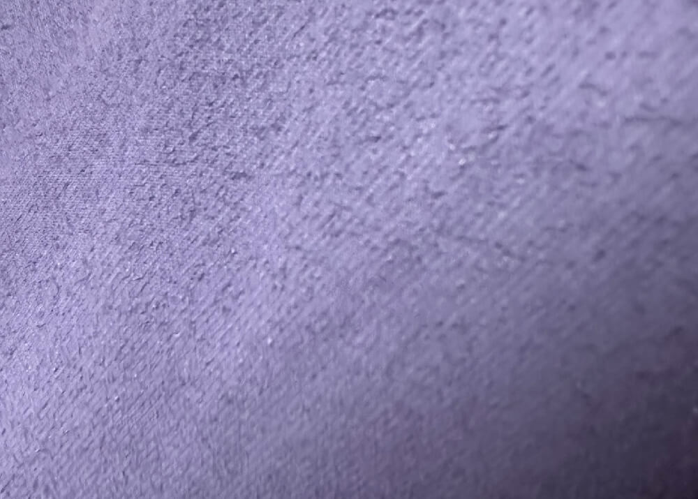 Close up of rough fabric texture after being spray painted.