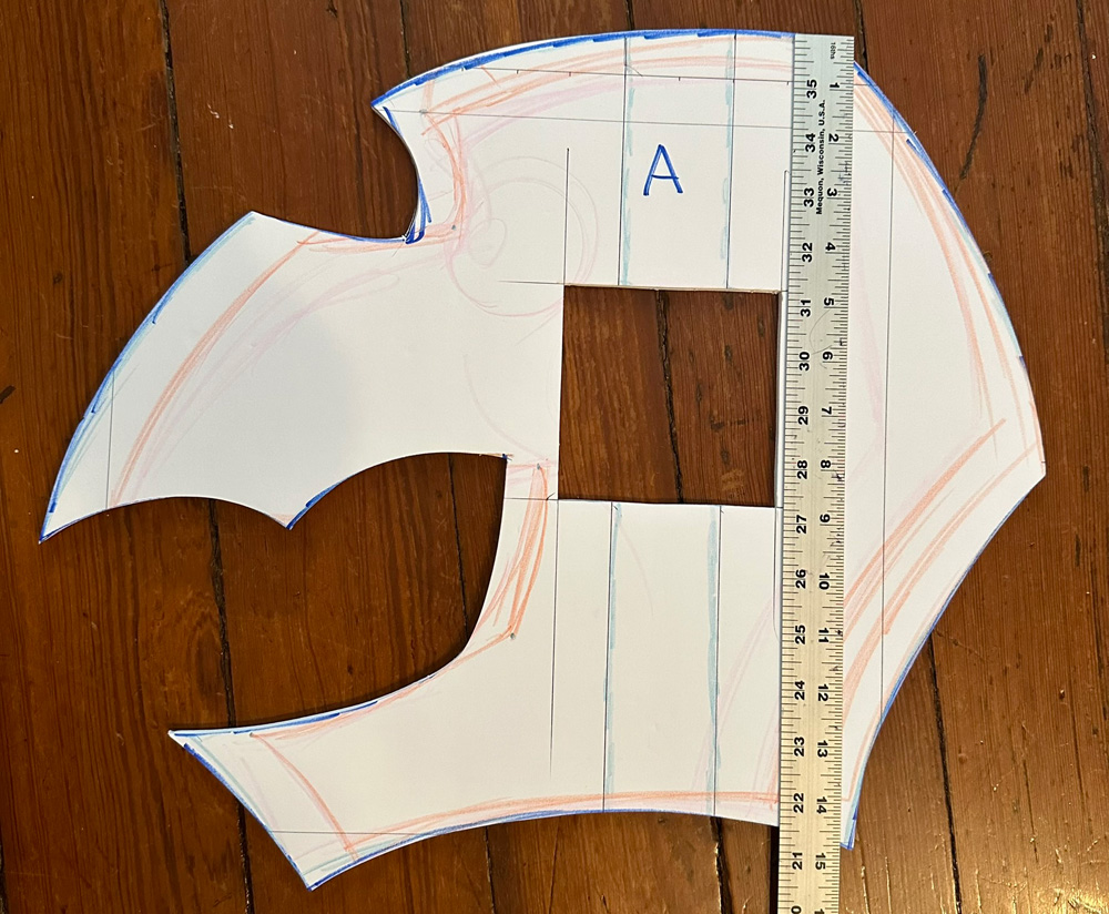 Cutting out foam slices in the shape of the gargoyle's profile