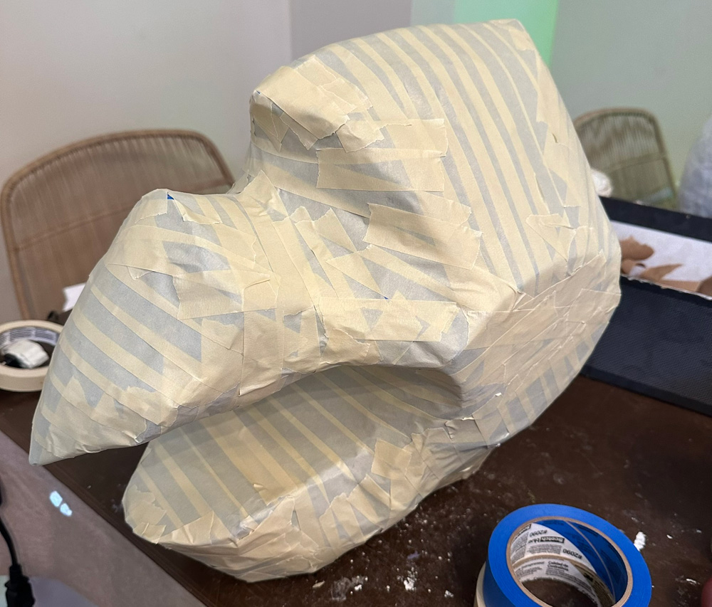 The mask shape covered in masking tape
