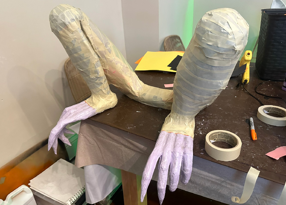 The legs are now completely covered in masking tape and look pretty close to finished.