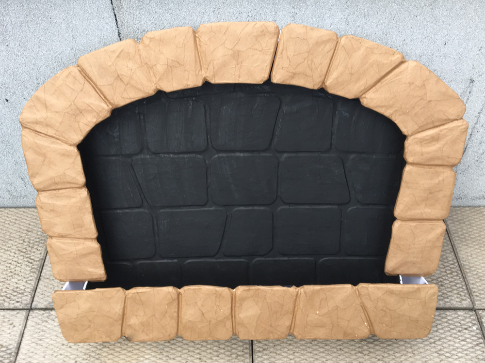 Hansel and Gretel oven prop - paper mach&eacute; on the the bricks /