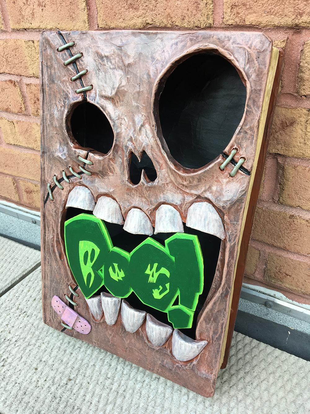 Haunted book sculpture - three-quarter view