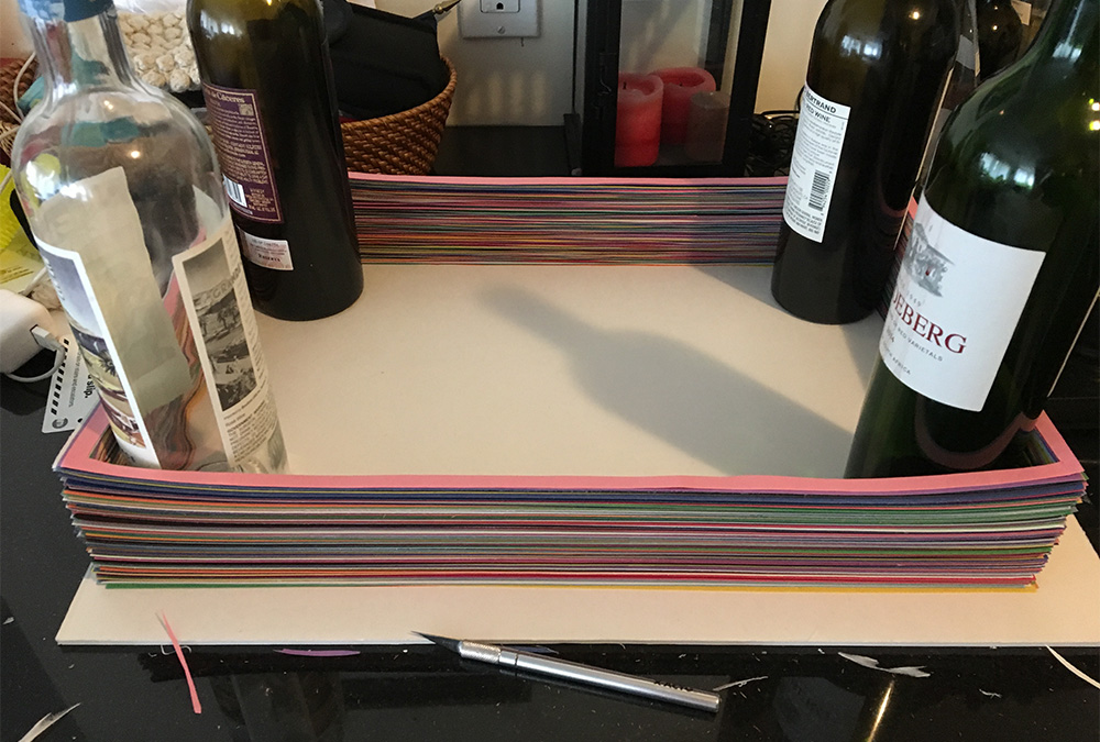 Haunted book sculpture - cutting out the page edges