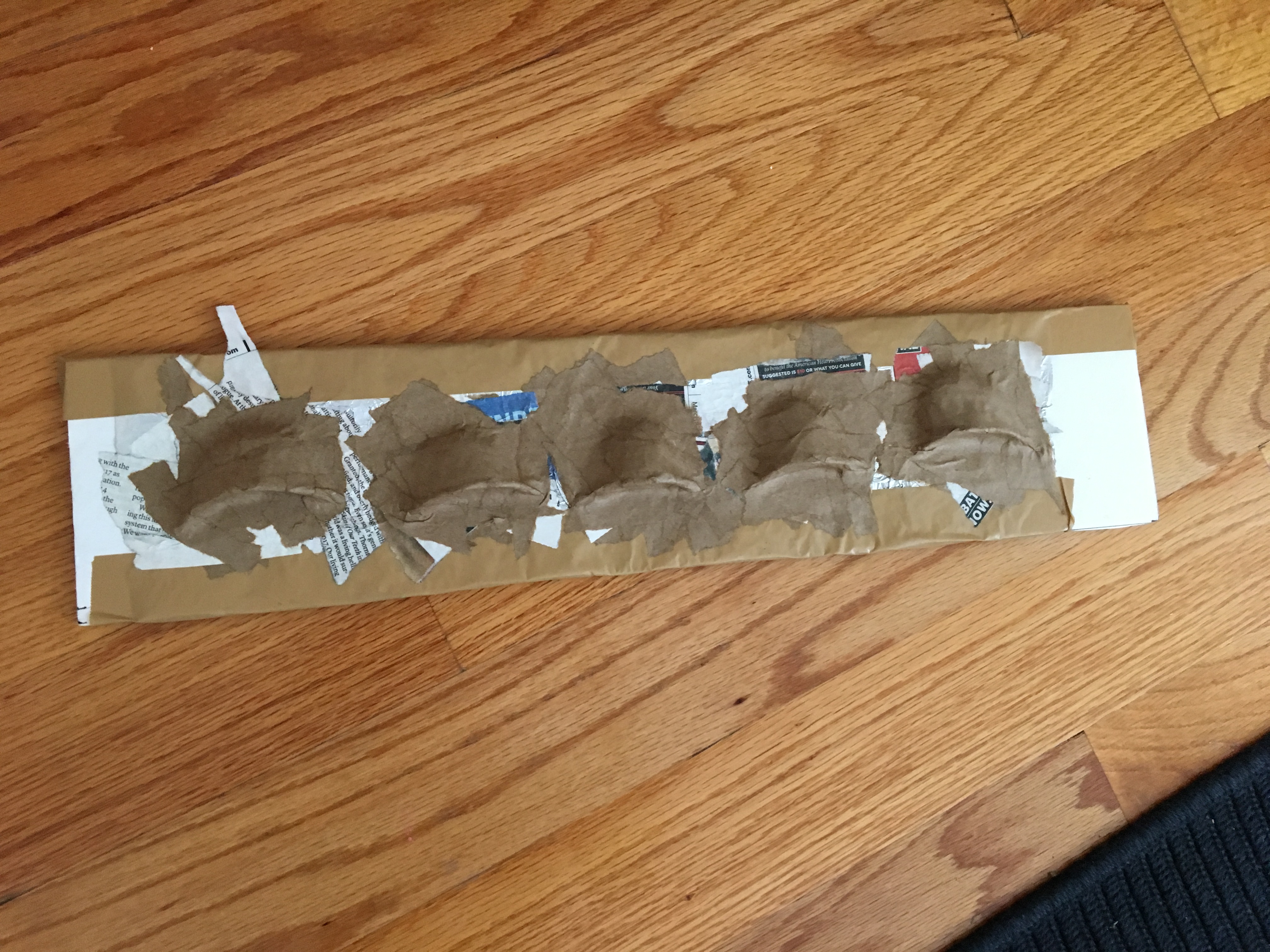 Haunted book sculpture - paper mache on the teeth