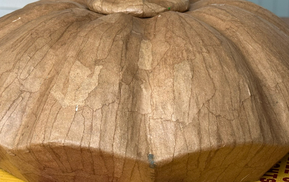 Another close up of the smooth surface of the unpainted sculpture.