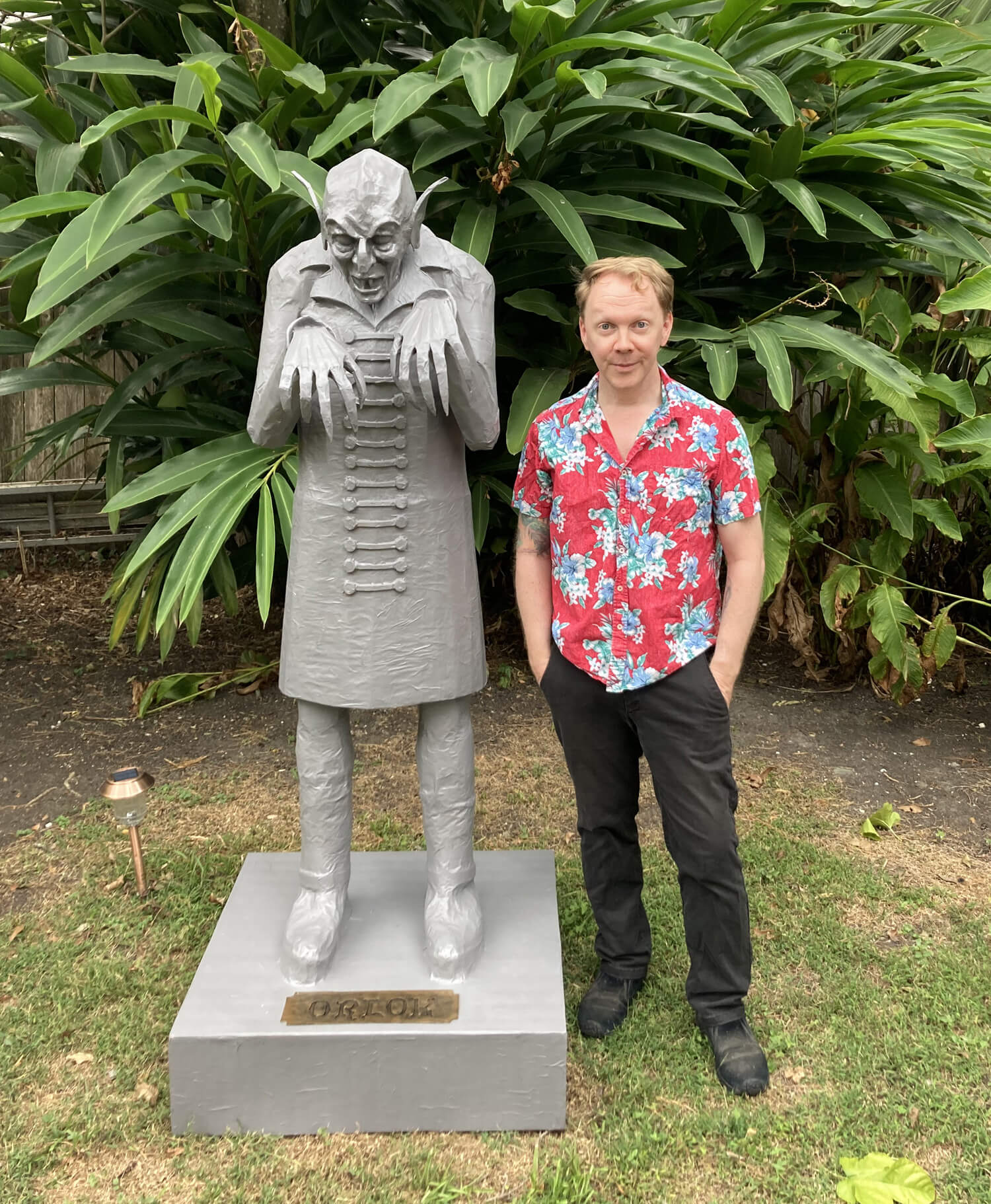 DIY Nosferatu statue - the artist standing next to the statue, for scale
