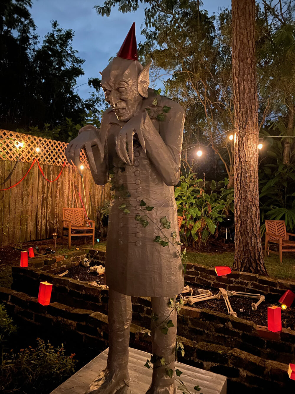 Count Orlok statue with fake ivy and party hat